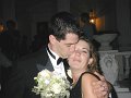 John kissing kim in at Wedding